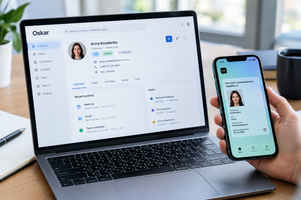 Екран CRM Оскар і смартфон з додатком Дія на робочому столі