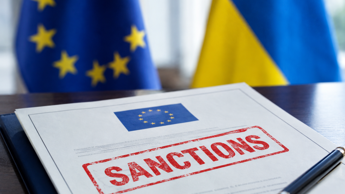 Офіційний документ ЄС про санкції на тлі прапорів ЄС і України