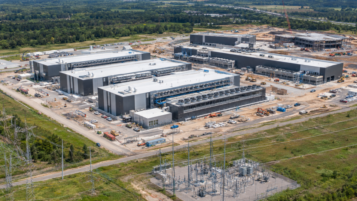aerial view of data center buildings and cooling units